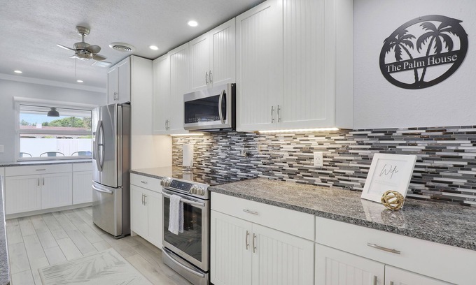 North Palm Beach House | Coastal home with 2 master suites, private pool, and close to the beach