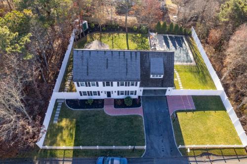 East Falmouth House | Colonial Vacation Home w Private Pool fire pit and spacious backyard