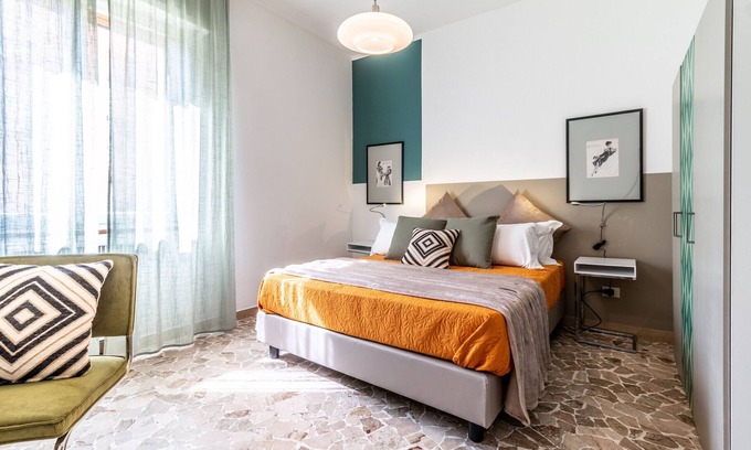 Historic Center Apartment | Colorful apartment in Riva di Reno by Wonderful Italy
