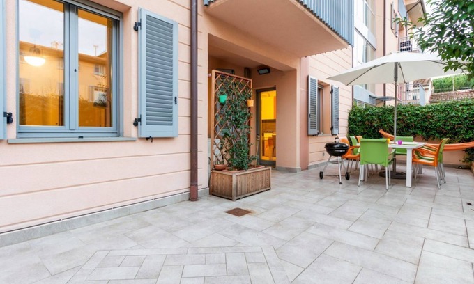 Le Cure Apartment | Colorful Boccaccio apt with Patio and Motorcycle Place