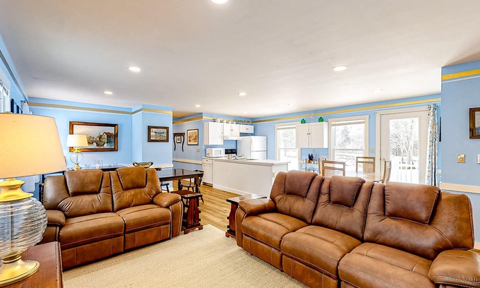 Boothbay Harbor House | Colorful duplex home with a large yard, deck, WiFi, & ideal Midcoast location