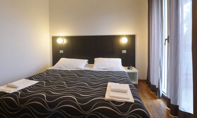 Pisa House | Comfort quadruple room