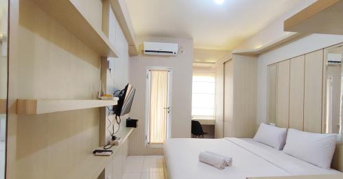 Semarang Apartment | Comfort Studio at Candiland Apartment By Travelio