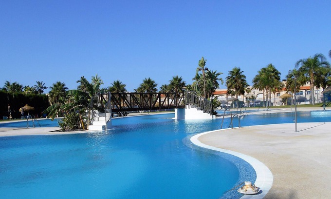 Almerimar Apartment | Comfortable apartment in residence with swimming pool, children's playground