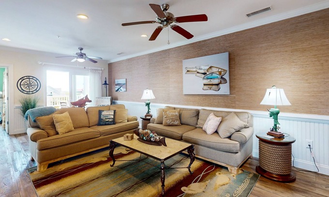 Hatteras Condo | Comfortable condo with shared pool, free WiFi, central AC, and water views