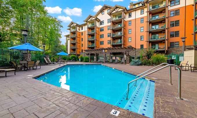 Gatlinburg Condo | Comfortable downtown condo w/free attraction tickets, fireplace, & hot tub/pool