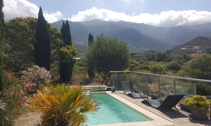 Oletta Apartment | Comfortable ground-floor apartment with pool access for two adults