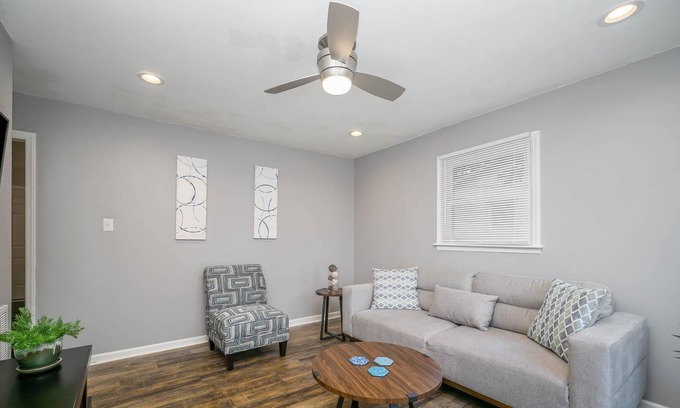 Rock Hill House | Comfortable ranch home with an art gallery vibe, updated kitchen and 55-inch smart TV.
