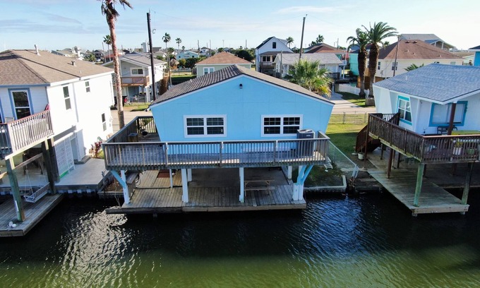 Jamaica Beach House | Comfy Canal Home 2 Min Dr to Beach + Outdoor Space/Fishing!