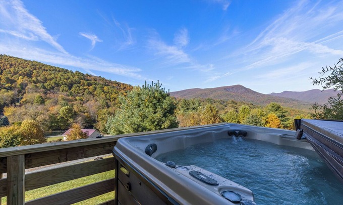 Buck Mountain Cabin | Cool Breezes & Mtn Views await You on the Deck This Sept @ Bluff Mtn Retreat