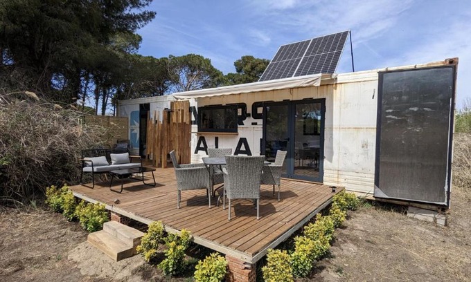 Castelldefels House | CoolTainer retreat Sustainable Coastal forest Tiny house near Barcelona by QuirkyGetaway