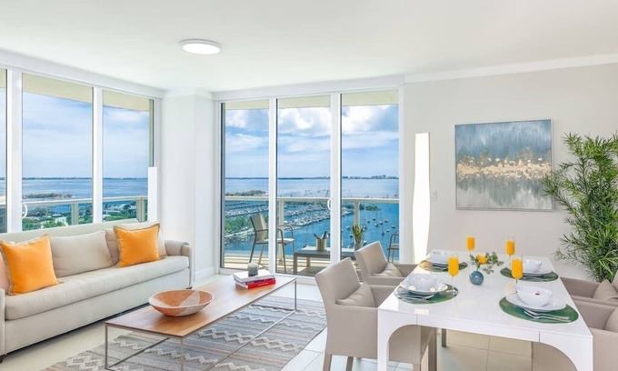 Coconut Grove Apartment | Corner Apartment, Wrap-around Balcony Facing the Sea. FREE Parking, Pool, Gym