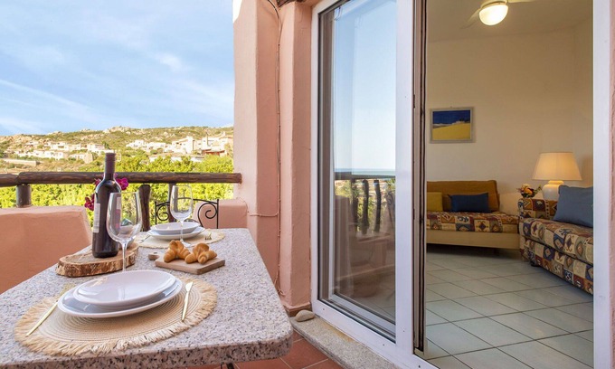 Canneddi Apartment | Cosy apartment for 4 people with WIFI, pool, A/C, TV, terrace and pets allowed