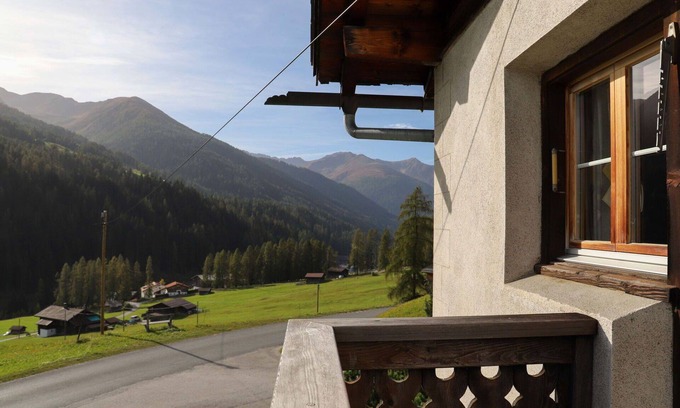 Frauenkirch Apartment | Cosy apartment for 3 guests with WIFI, TV, terrace, panoramic view and parking