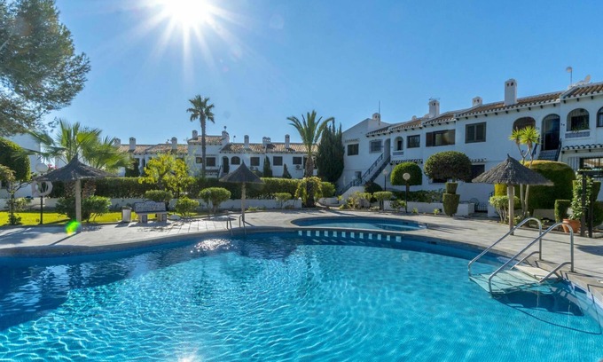 Orihuela Costa Apartment | Cosy apartment for 3 people with A/C, WIFI, pool, TV, terrace and parking