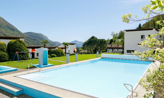Capriasca Apartment | Cosy apartment for 6 guests with pool, WIFI, TV, patio, panoramic view and parking