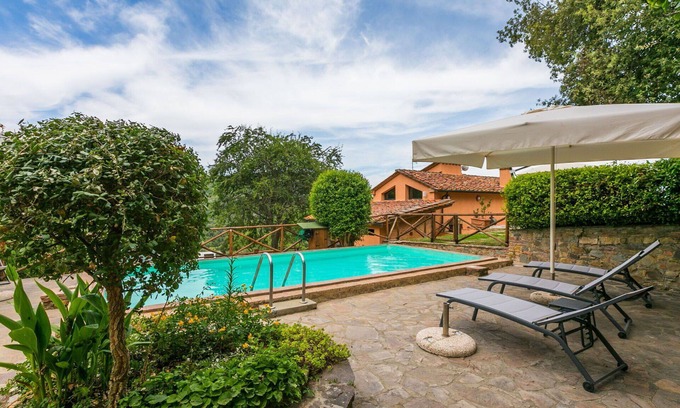 Castagneto Carducci Villa | Cosy apartment in villa for 4 guests with WIFI, A/C, pool, TV, patio, pets allowed and parking