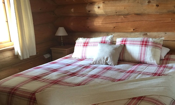 Knockin Cabin | Cosy Log Cabin in rural Shropshire overlooking fishing lakes