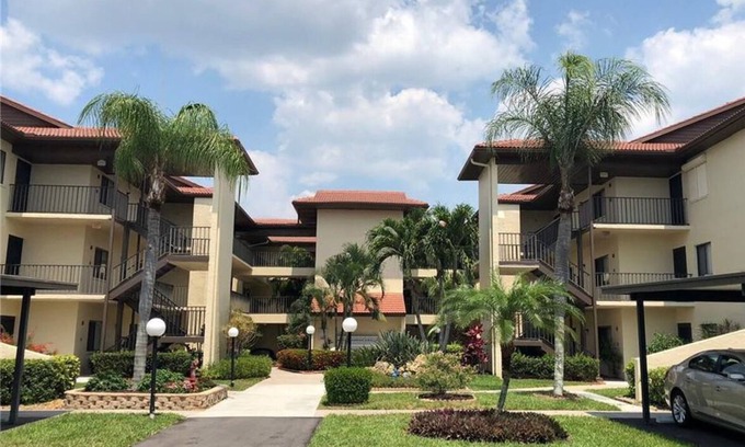Iona Condo | Couples' lake-view condo perfectly located near beaches, dining & stores!