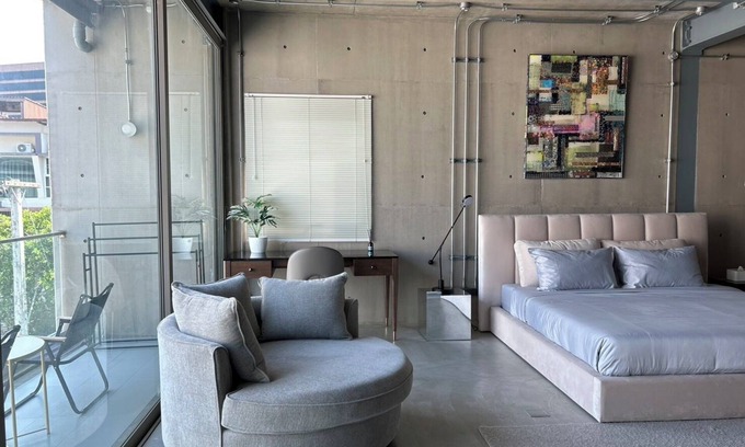 Nimman House | Cozy loft-style rooms, private baths, free Wi-Fi, A/C, and shared spaces.