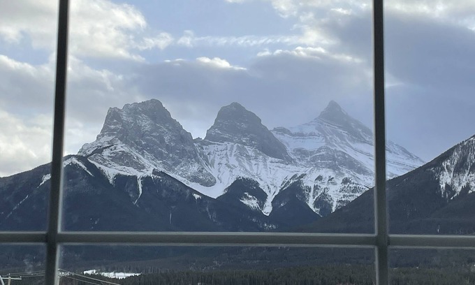 Canmore Apartment | Cozy 1 bedroom apartment in Canmore Rockies. 3 sister view from bedroom window