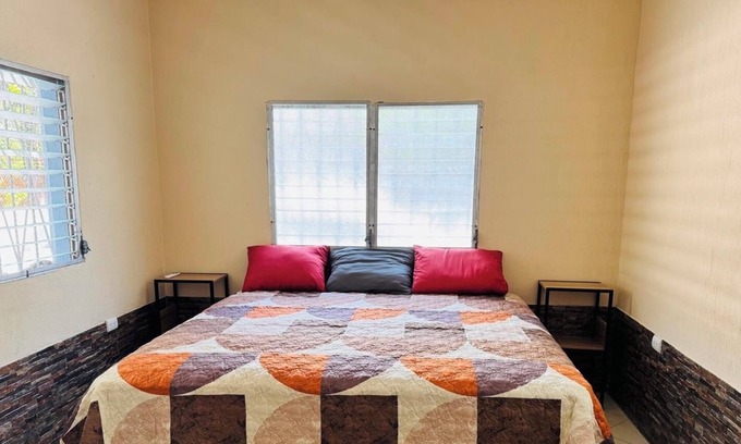 Izabal House | Cozy 2-bedroom house in welcoming Puerto Barrios with AC