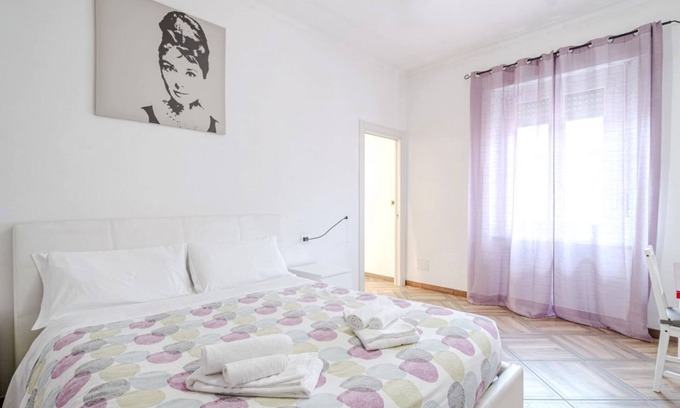 San Paolo Apartment | Cozy 72 sqm apartment in Turin, perfect for 4 guests, located on the fourth floor of an elegant 1930s building (no elevator). It features two balconies with bright views. The property is in a lively and well-served area, just steps away from shops, resta
