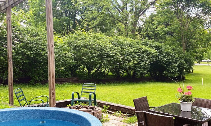 Greenville House | Cozy air conditioned 3 bedroom house, fire pit, grill, hot tub, run all year!