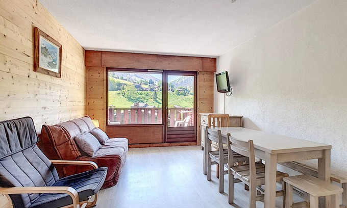La Clusaz Apartment | Cozy apartment with south balcony and wifi, pets allowed