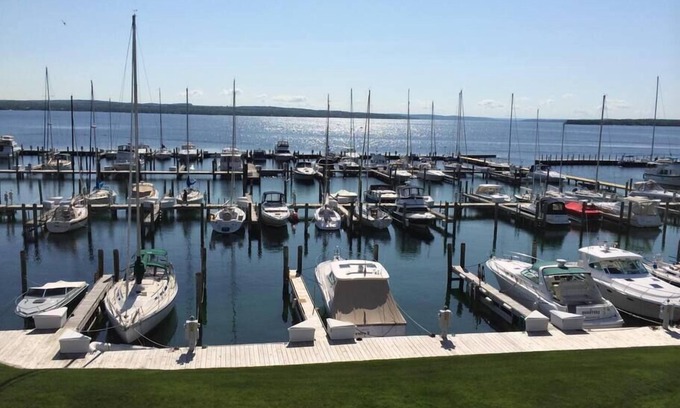 Charlevoix Condo | Cozy Boat House II Lake Charlevoix: Amazing Views and Pool