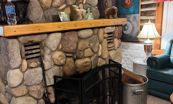 Kalkaska Cabin | Cozy cabin with wood burning fireplace. Ride in/out the snowmobile/ORV trails