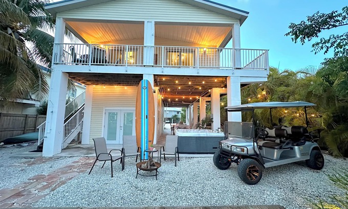 Cutthroat Harbor Estates House | Cozy Canal-Front Home in Cudjoe Key — Dock, Hot-Tub & Golf Cart Included!