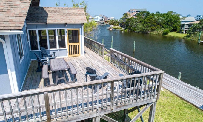 Brigands' Bay House | Cozy Canalfront Cottage w/Hot Tub, Private Boat Dock, Smart TVs, Screened Porch