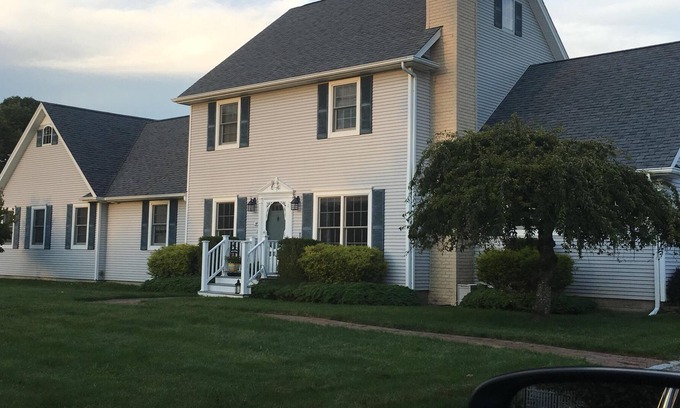 Remsenburg House | Cozy Farm House Retreat in The Quaint Hamlet of Remsenburg with Heated Pool