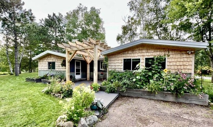 Hayward Cabin | Cozy Lakefront Cabin with Private Dock, Firepit, Grill, Kayaks and More!