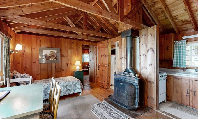 Northport Cabin | Cozy Log Cabin with Deck & Picnic Table & Gorgeous Views