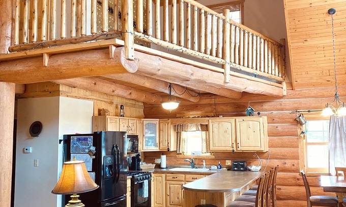 Rome Cabin | Cozy Log Cabin with fireplace, pool table, deck, and spacious kitchen!
