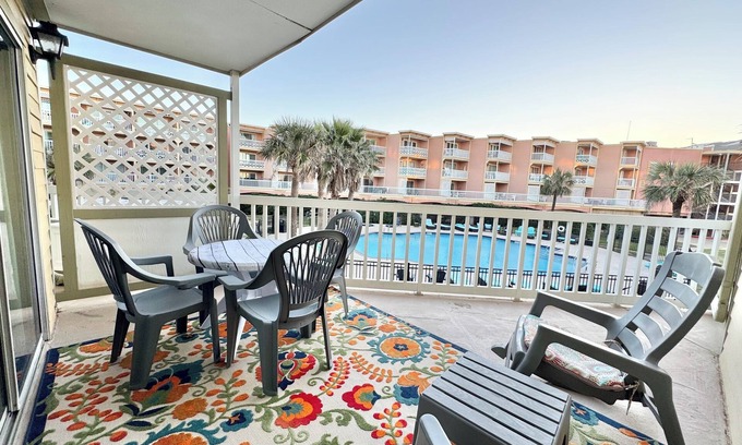 Galveston Condo | Cozy Poolside Condo with over-sized balcony and Gulf Views!
