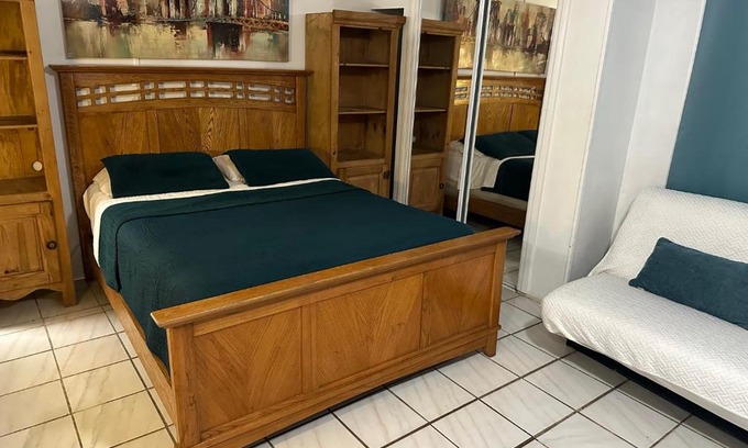 Tamiami Apartment | Cozy Queen Bed Studio with 60 Inch Smart TV, Netflix, AirPlay, Mini-Fridge, and 500 Mbps WiFi near FIU, Dolphin Mall, Airport