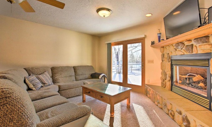 Houghton Lake House | Cozy Riverfront Home with Fire Pit in Houghton Lake!