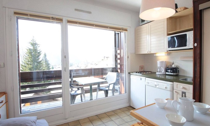 Les Carroz-d'Araches Apartment | Cozy Studio for 4, Ski-In/Ski-Out, Balcony with Village Views