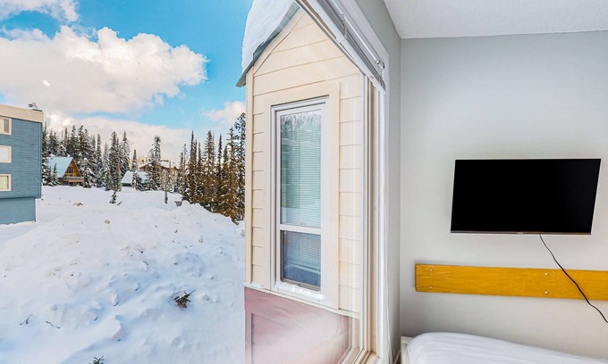 Big White Ski Resort Apartment | Cozy studio with kitchenette, WiFi, & shared seasonal hot tub - walk to lifts