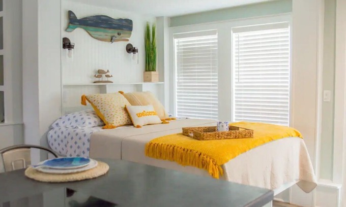 Harkers Island Resort | Cozy waterfront retreat with lighthouse view.