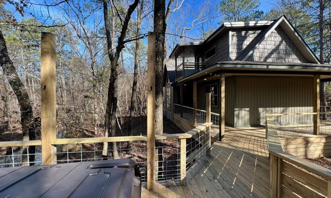 Muse Cabin | Creekside forest hideaway with hot tub near ATV trails