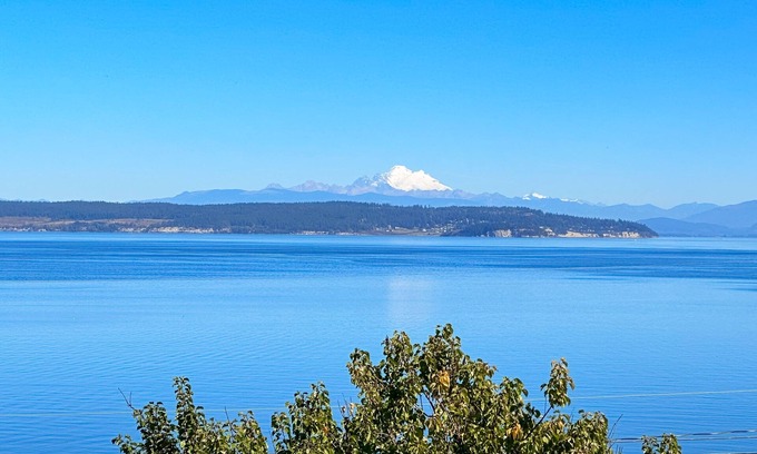 Coupeville House | Custom estate with Puget Sound views, dual masters, fireplace, beach access