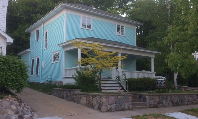 Harbor Springs House | Daybreak Cottage Walk to Beach, Town and Yacht Club sit on the Front Porch