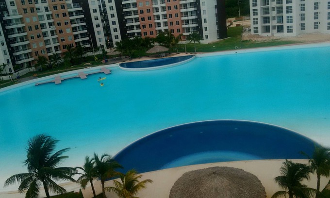 Downtown Cancun Apartment | Departamento con laguna cristalina de 2 hectáreas.