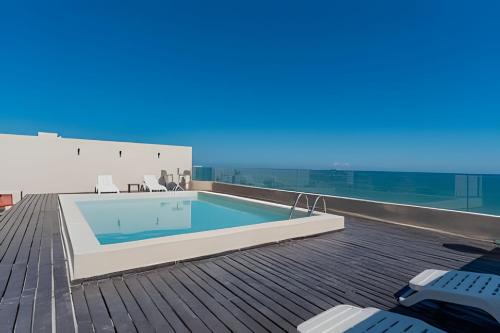 Chicxulub Puerto House | Depto de Playa con vista Alberca