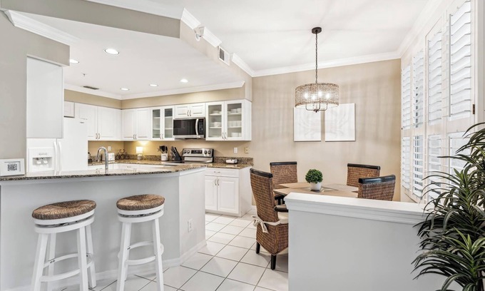 Bonita Springs Condo | Desired Pelican Landing First Floor Coach Home