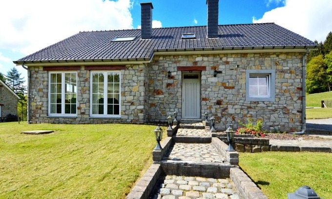 Trou de Bra House | Detached natural stone house with sunny garden and terrace modern interior